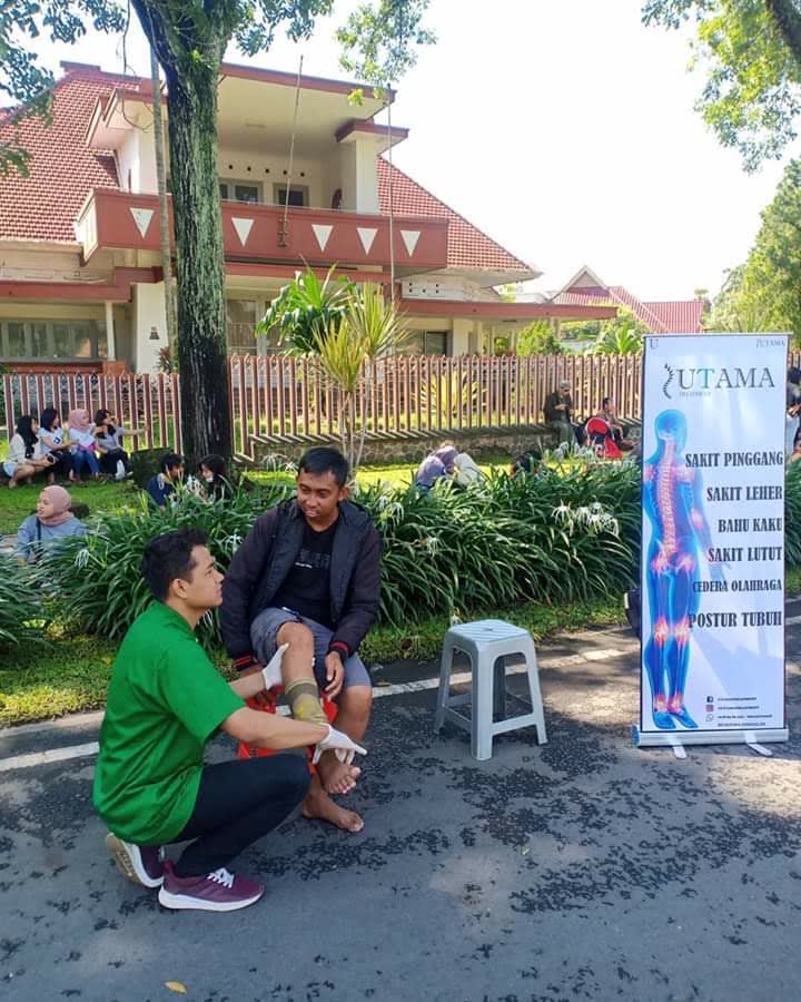 Free treatments at a community outreach day in a park