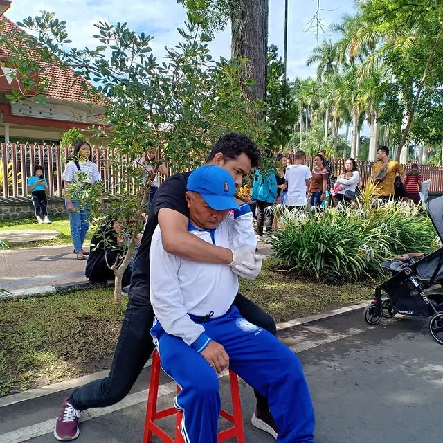 Shoulder and neck adjustment at an outdoor community event